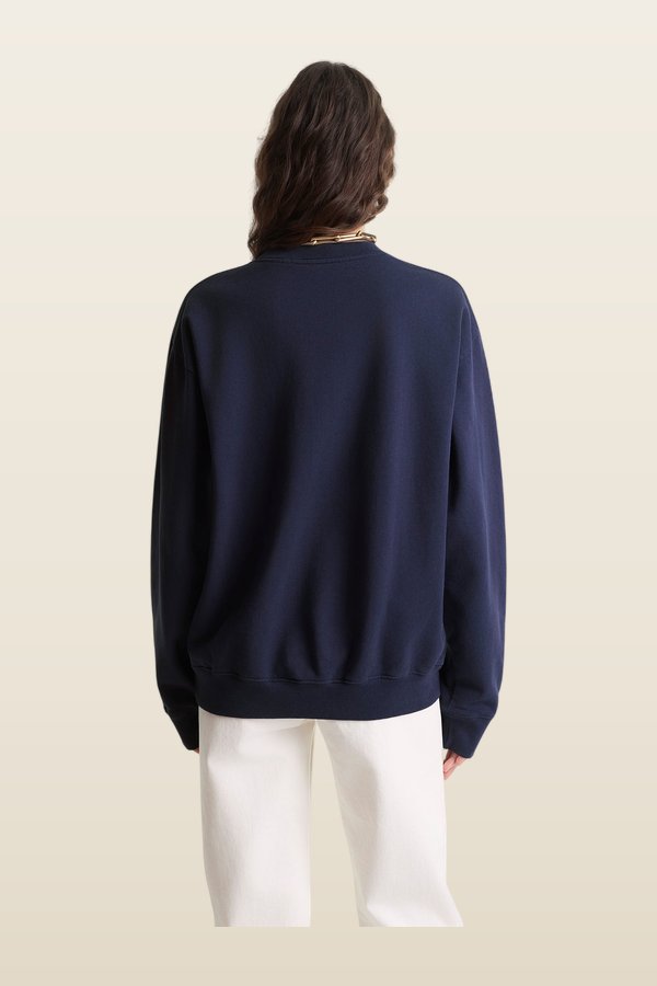 BH Crest Crewneck — model back