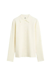 Compact knit buttoned top — packshot