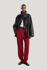 Sculptural leather jacket — model front