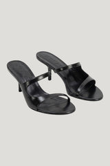 Serena Black Semi Patent Leather Slip-On Mule — model front