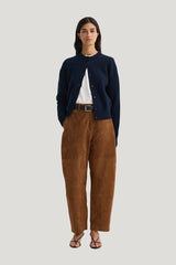 Sculptural suede trousers — model front