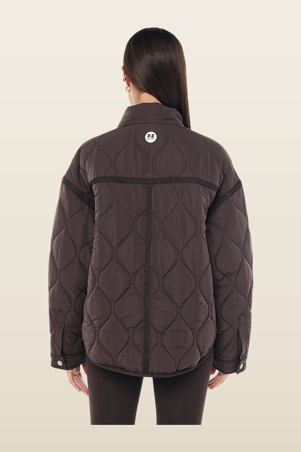 Surge Quilt Jacket In Coffee — model back
