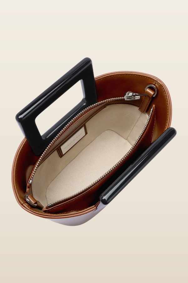 Baby Riviera In Caramel Leather — model back