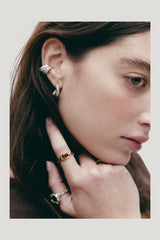 Cau Earrings Silver — model side