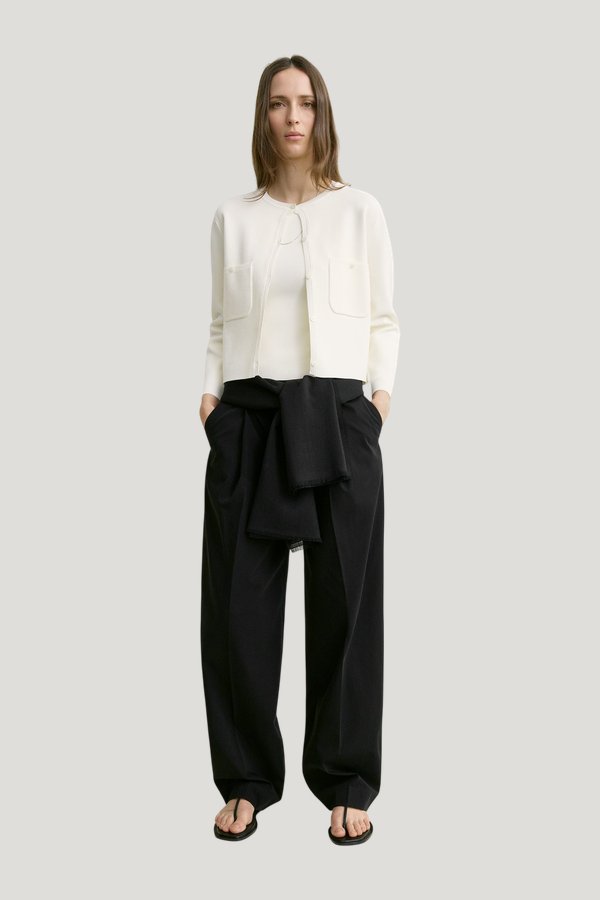 Classic compact knit cardigan — model front