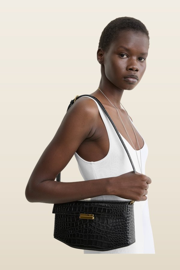 Clip croco-embossed clutch — model back