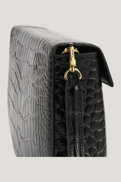 Clip croco-embossed clutch — model side