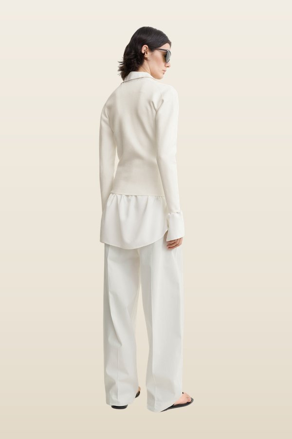 Compact knit v-neck — model back