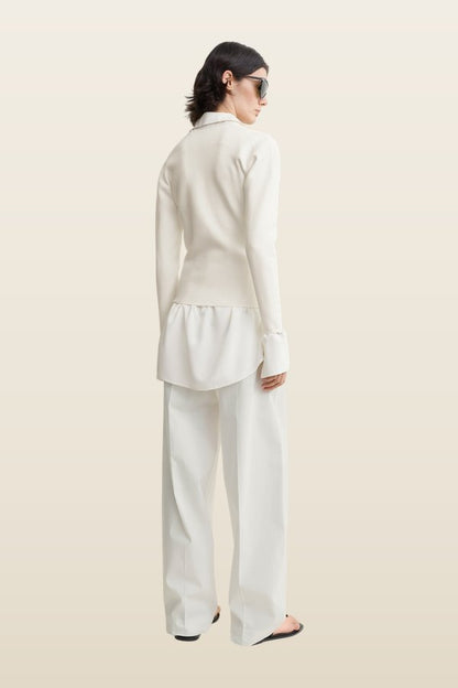 Compact knit v-neck — model back