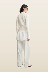Compact knit v-neck — model back