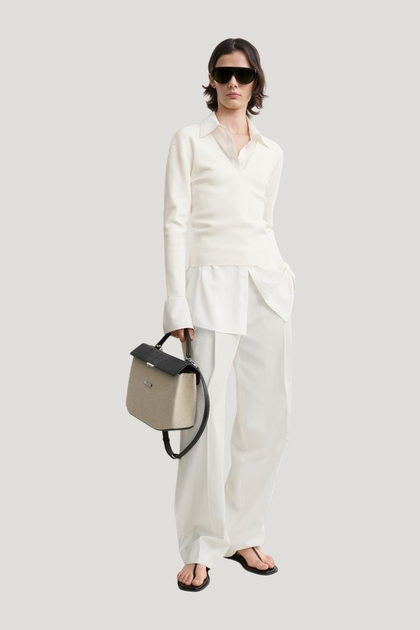 Compact knit v-neck — model front