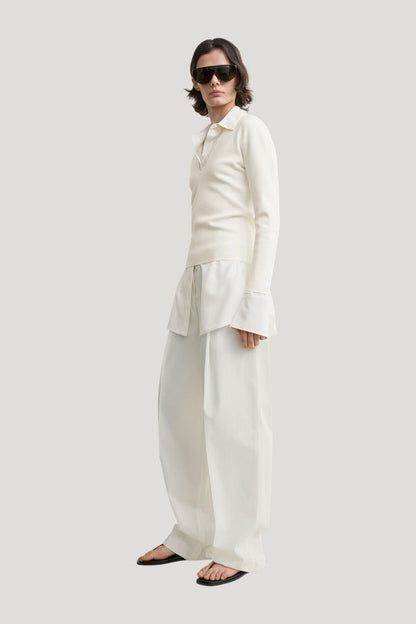 Compact knit v-neck — model side