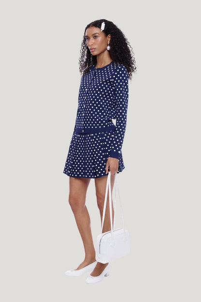 Ermine Skirt In Navy White Polka Dot — model side