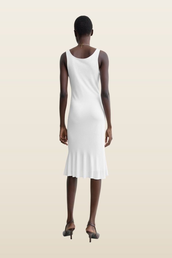 Fluted hem dress optic — model back
