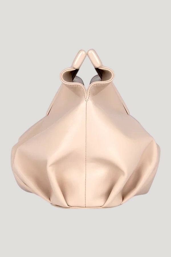 Georgia In Nude Leather — model side