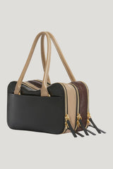 Black, brown and taupe leather small Boxyne bag — model side