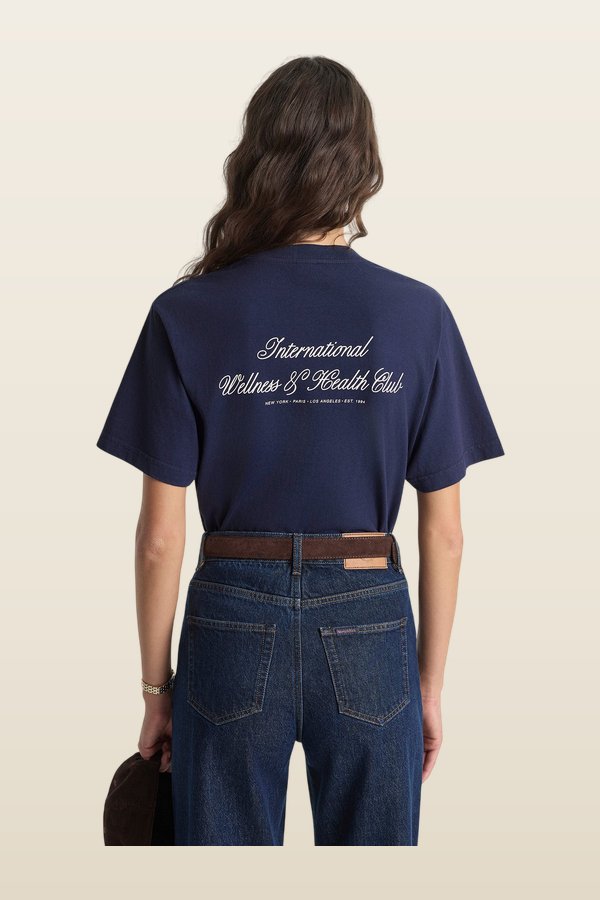 International T-Shirt — model back