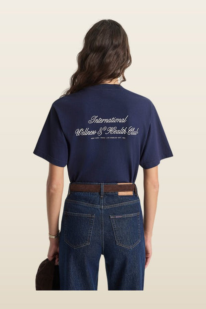 International T-Shirt — model back