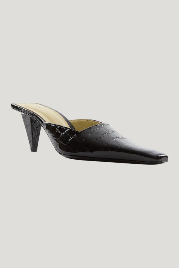 Iris Mule in Black Croc Embossed Leather — model front