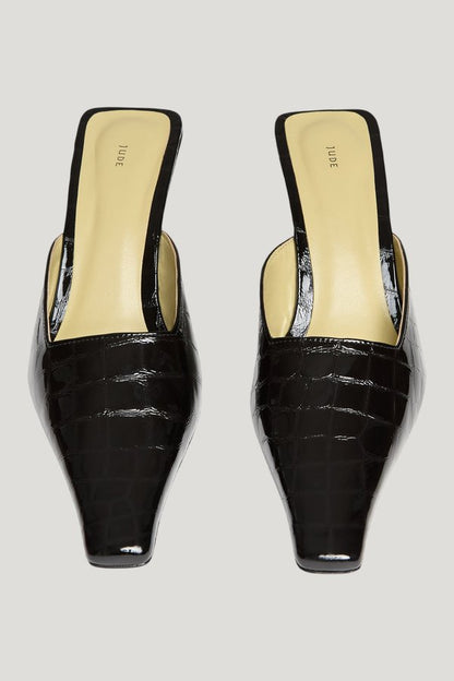 Iris Mule in Black Croc Embossed Leather — model side