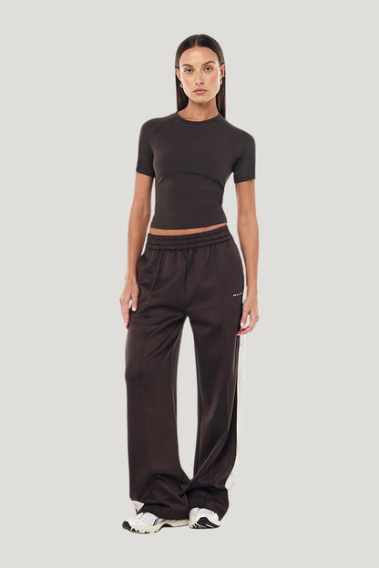 Man Down Trackpant In Coffee — model front