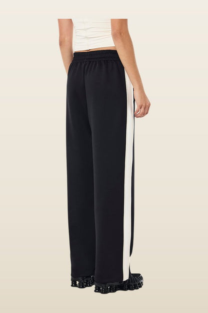 Man Down Trackpant In Black & Whisper — model back