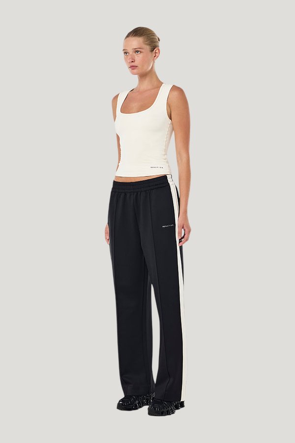 Man Down Trackpant In Black & Whisper — model side