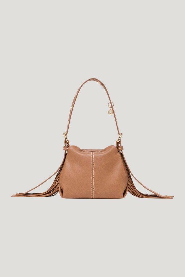 Miss M micro stitched leather bag — model side