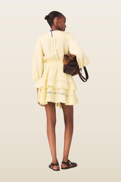 Short ruffled dress — model back