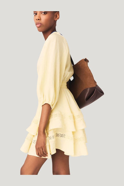Short ruffled dress — model side