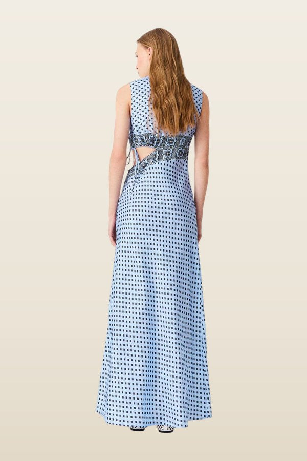 Patterned cutaway dress — model back