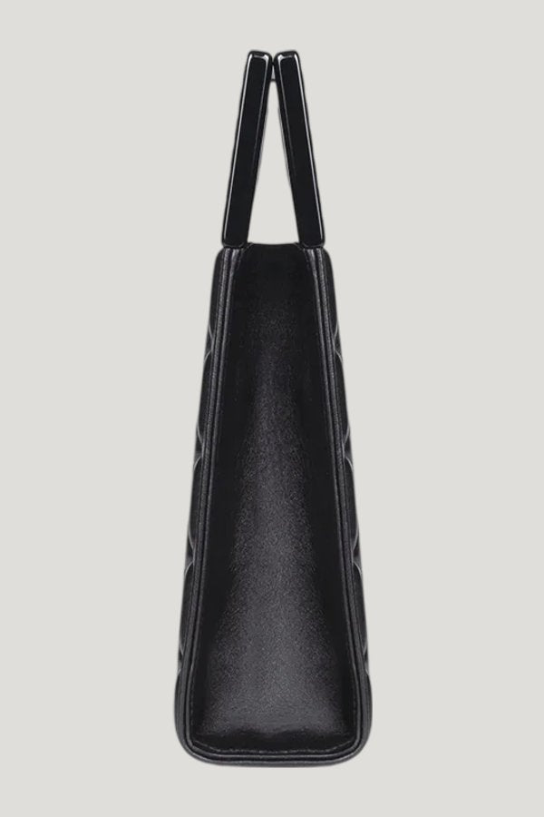 Micro Bella In Black Quilted Leather — model side