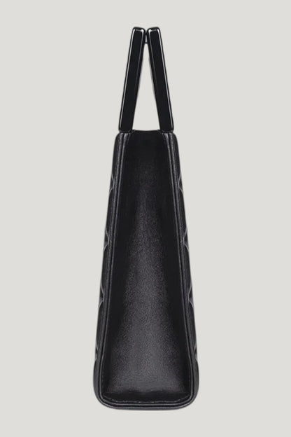 Micro Bella In Black Quilted Leather — model side