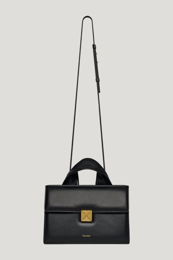 The SANDI Lock - Top handle bag — model side