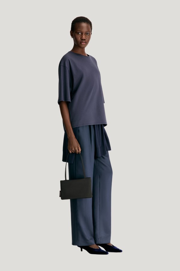 OSIS LDS Oversized T-shirt — model side