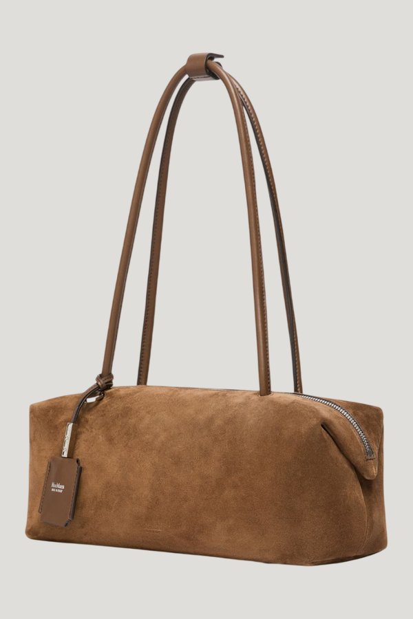 Horizontal Boston bag in split leather — model front
