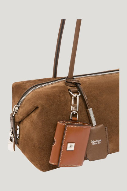 Horizontal Boston bag in split leather — model side