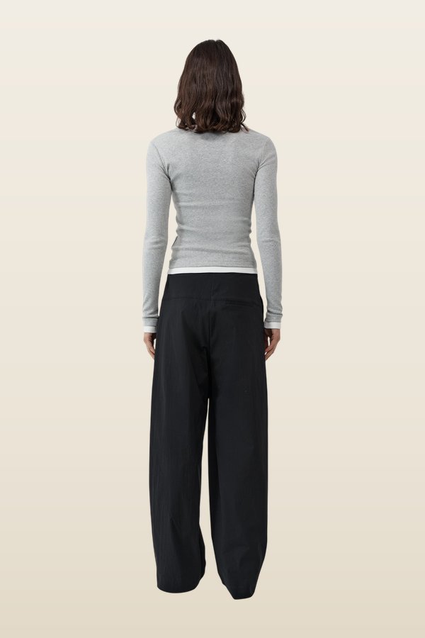 Relaxed Pleat Pants — model back