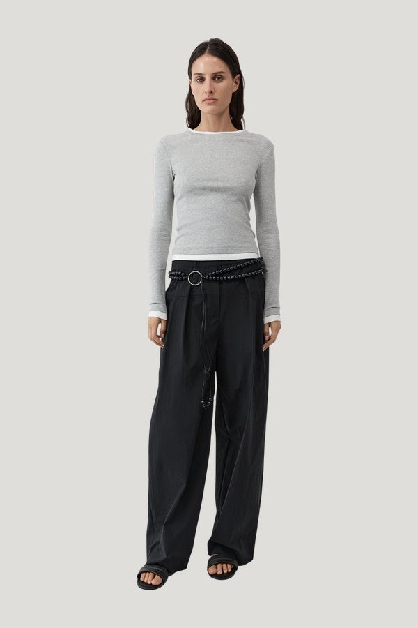 Relaxed Pleat Pants — model side