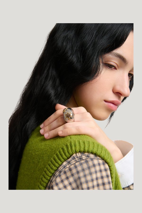 Orange rhinestone daisy ring — model front