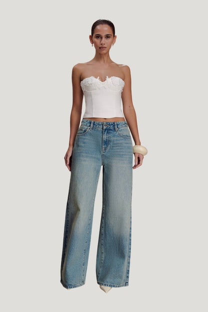 Romi Mid Rise Wide Leg Jeans - Faded Mid — model front
