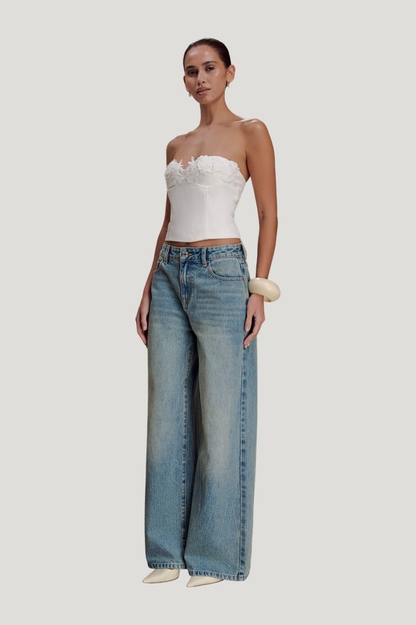 Romi Mid Rise Wide Leg Jeans - Faded Mid — model side
