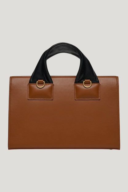 The SANDI Lock - Top handle bag — model side