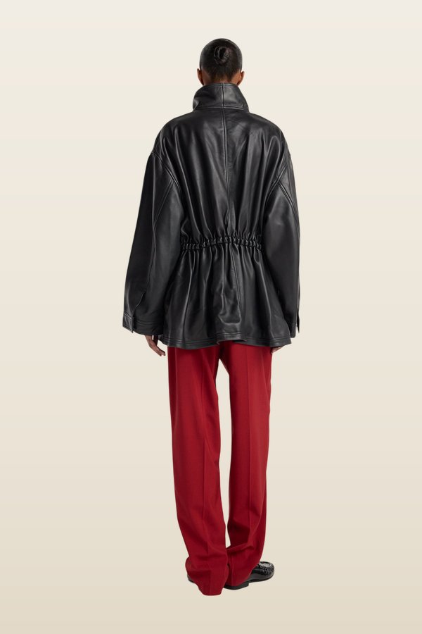 Sculptural leather jacket — model back