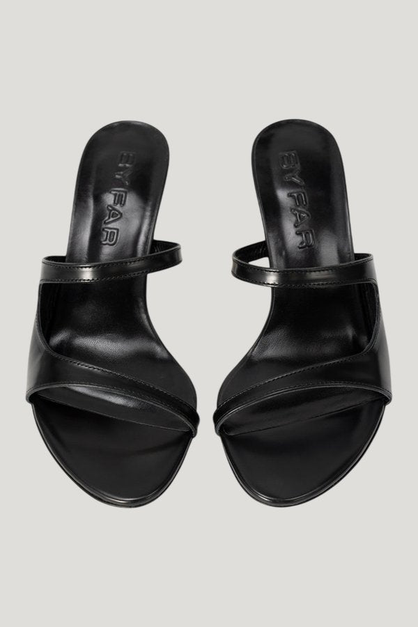 Serena Black Semi Patent Leather Slip-On Mule — model side