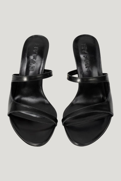 Serena Black Semi Patent Leather Slip-On Mule — model side