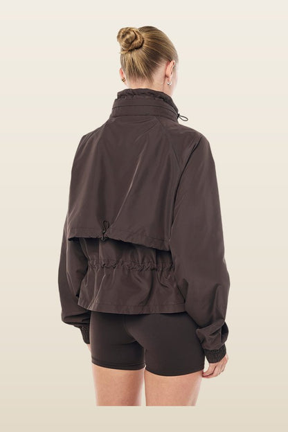 Shelter Jacket In Coffee — model back