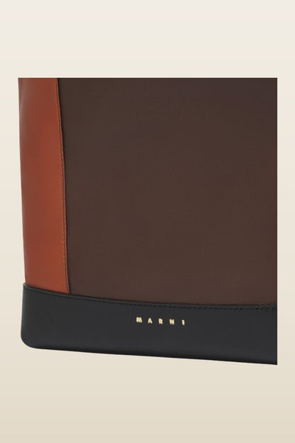Light brown, dark brown and black leather Pod 2.0 bag — model back