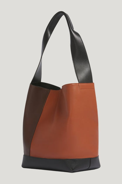 Light brown, dark brown and black leather Pod 2.0 bag — model front