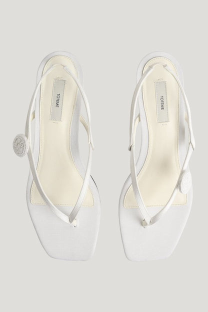 Slingback satin flip flops — model front